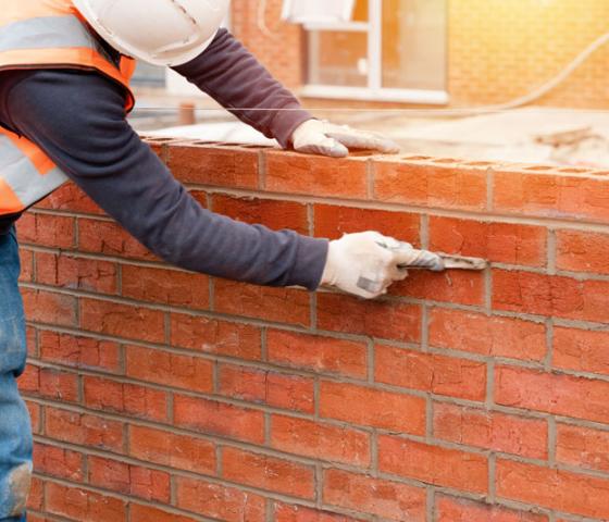 man bricklaying