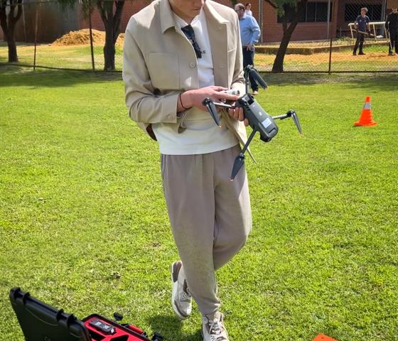 Student flying drone