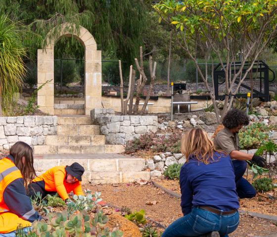 Horticulture students working in garden.