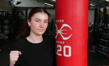 South regional Tafe student Seanadh McEleney standing next to a boxing bag